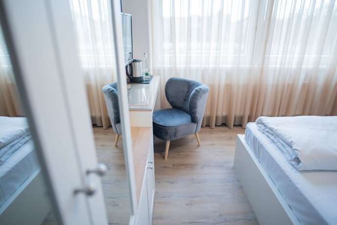 Imagen de la habitación del Hotel Leo. Foto 18