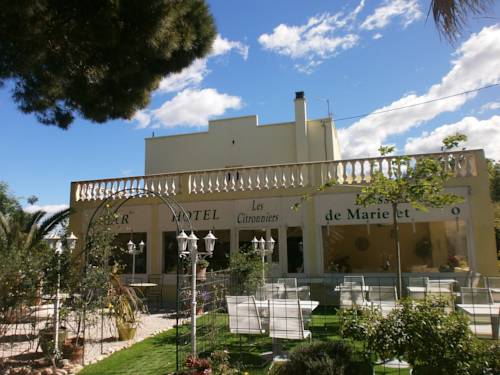 Imagen de la habitación del Hotel Les Citronniers. Foto 2