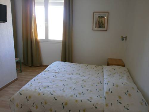 Imagen de la habitación del Hotel Les Citronniers. Foto 5