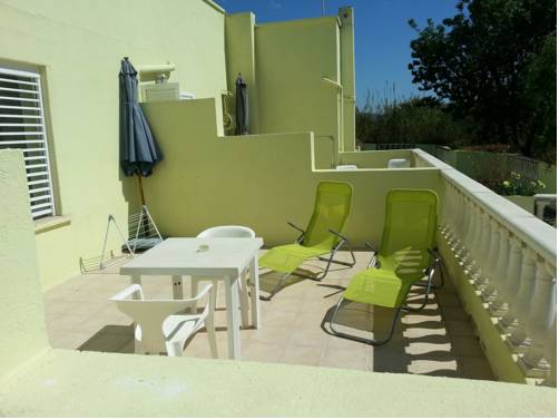 Imagen de la habitación del Hotel Les Citronniers. Foto 12