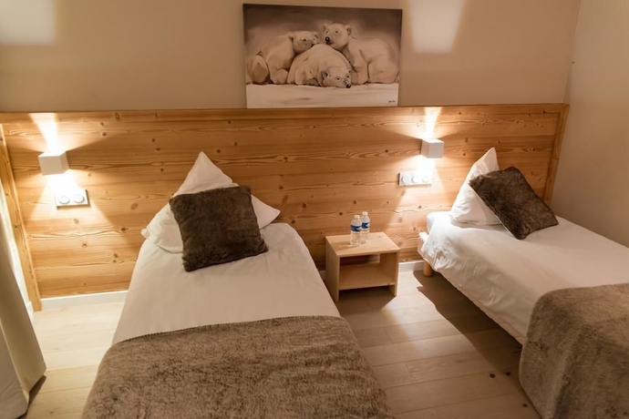 Imagen de la habitación del Hotel Les Flocons. Foto 8