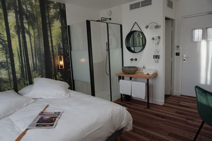 Imagen de la habitación del Hotel Les Glycines. Foto 8