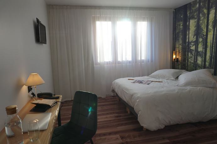 Imagen de la habitación del Hotel Les Glycines. Foto 9