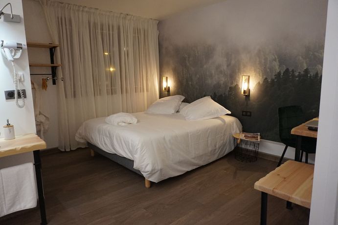 Imagen de la habitación del Hotel Les Glycines. Foto 11