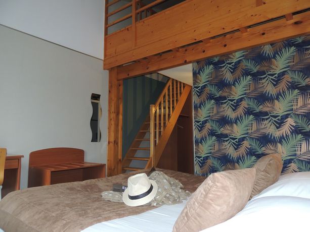 Imagen de la habitación del Hotel Les Trois Marchands. Foto 4