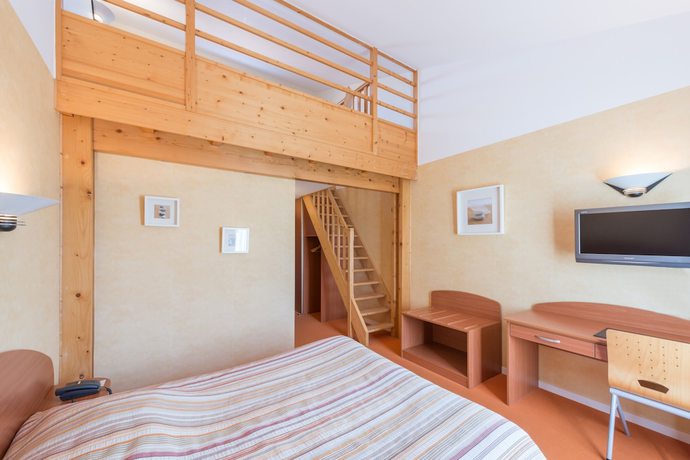 Imagen de la habitación del Hotel Les Trois Marchands. Foto 8