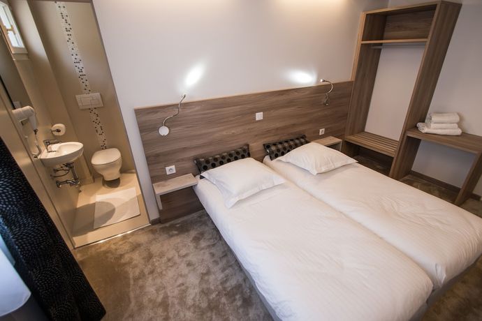 Imagen de la habitación del Hotel Les Voyageurs. Foto 3