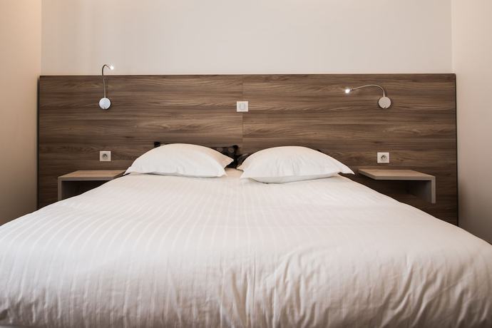 Imagen de la habitación del Hotel Les Voyageurs. Foto 8