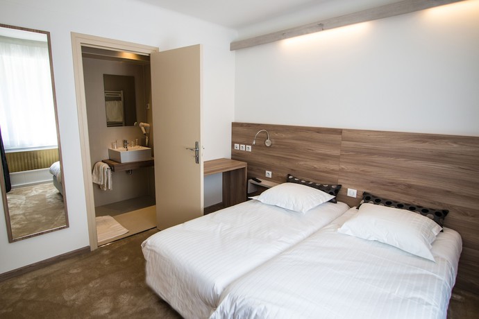 Imagen de la habitación del Hotel Les Voyageurs. Foto 14