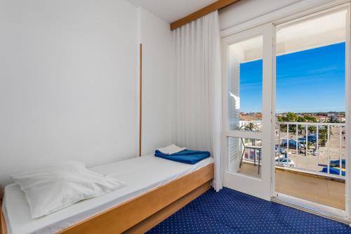 Imagen de la habitación del Hotel Loža Novalja. Foto 7