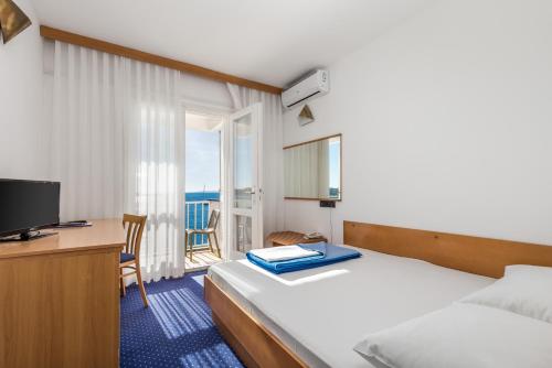 Imagen de la habitación del Hotel Loža Novalja. Foto 9