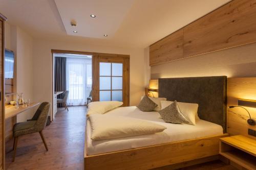 Imagen de la habitación del Hotel Luggi. Foto 17