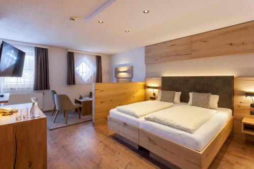Imagen de la habitación del Hotel Luggi. Foto 18
