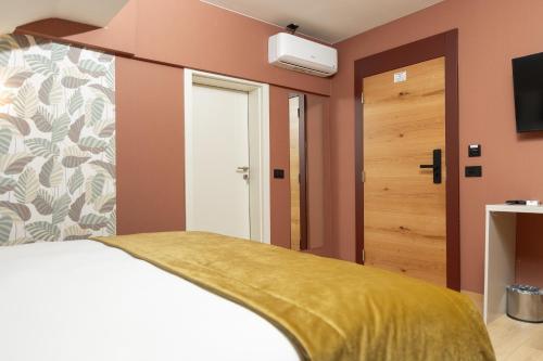 Imagen de la habitación del Hotel Ma Belle. Foto 15