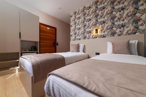 Imagen de la habitación del Hotel Ma Belle. Foto 17