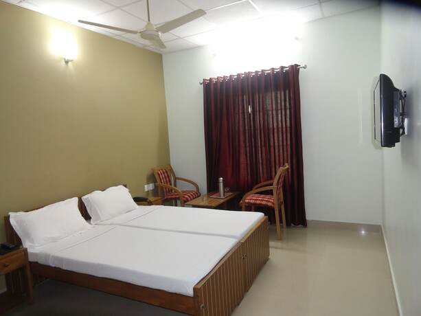 Imagen de la habitación del Hotel Madikeri Heritage. Foto 15
