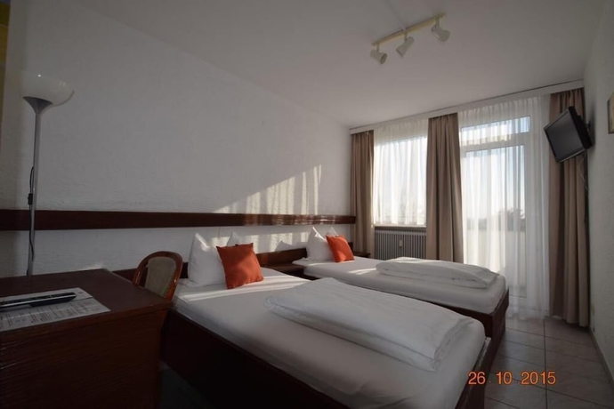 Imagen de la habitación del Hotel Main Taunus. Foto 11