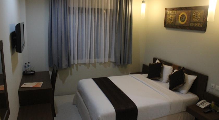 Imagen de la habitación del Hotel Mataram Square. Foto 1