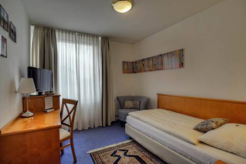 Imagen de la habitación del Hotel Maxim. Foto 11