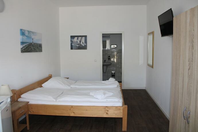 Imagen de la habitación del Hotel Maximo. Foto 11