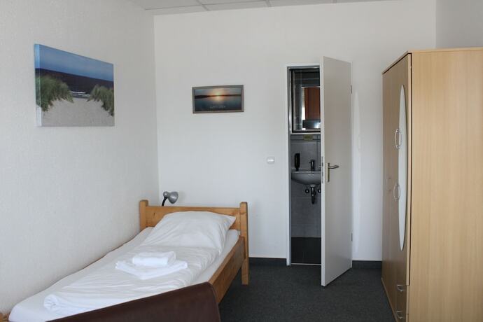 Imagen de la habitación del Hotel Maximo. Foto 15