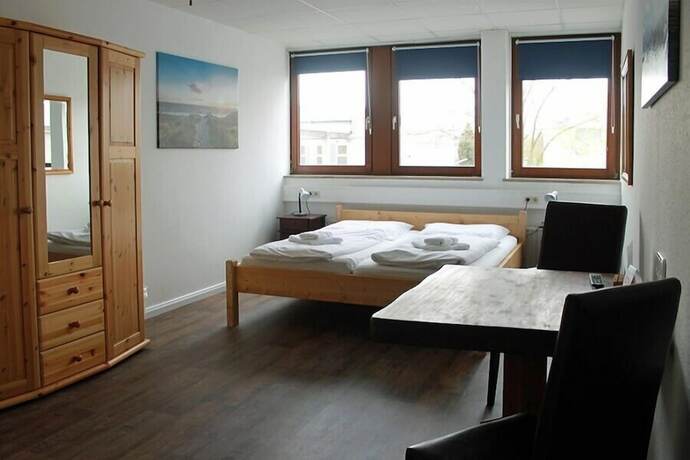 Imagen de la habitación del Hotel Maximo. Foto 18
