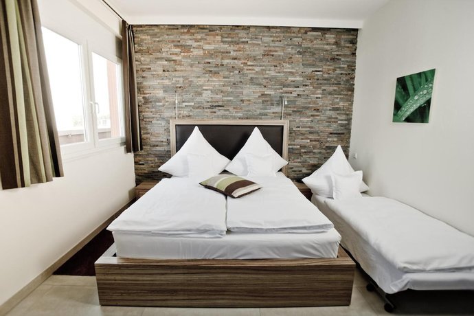 Imagen de la habitación del Hotel Maxis. Foto 12