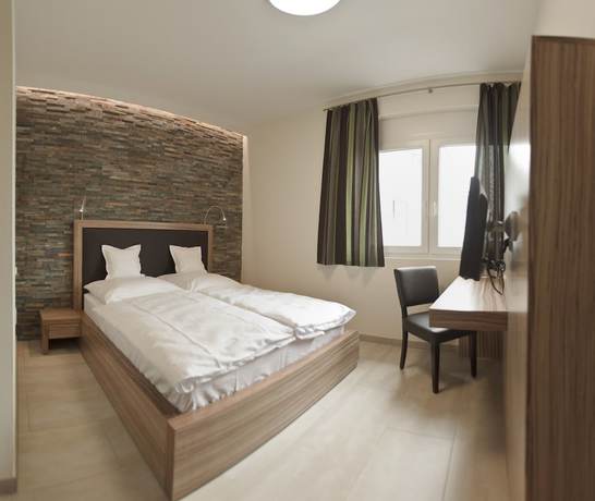 Imagen de la habitación del Hotel Maxis. Foto 14