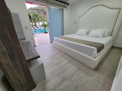Imagen de la habitación del Hotel Med Taganga. Foto 18