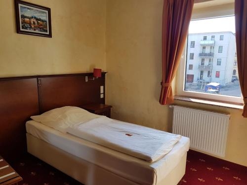 Imagen de la habitación del Hotel Medaillon. Foto 6