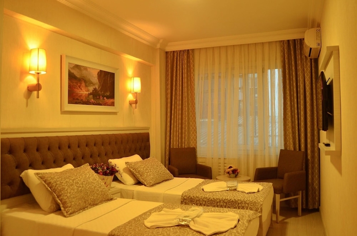 Imagen de la habitación del Hotel Mekke. Foto 2