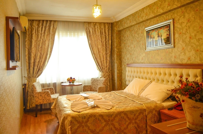 Imagen de la habitación del Hotel Mekke. Foto 6