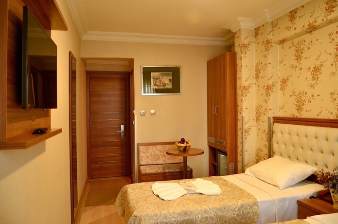 Imagen de la habitación del Hotel Mekke. Foto 11