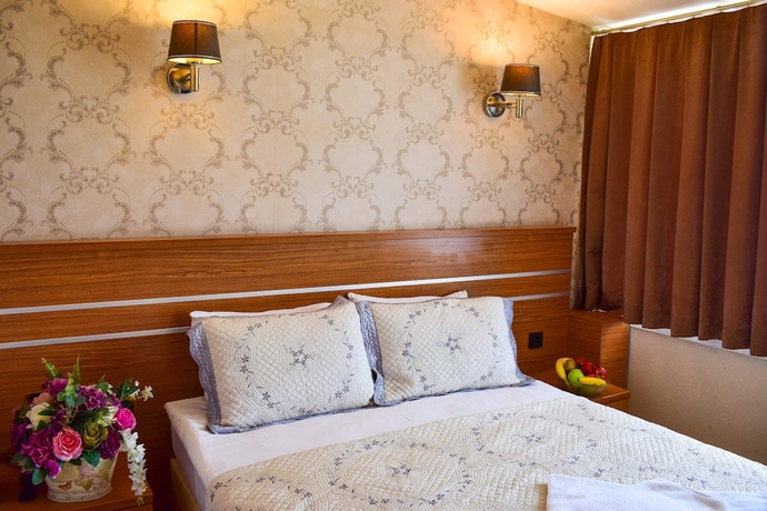 Imagen de la habitación del Hotel Mekke. Foto 14