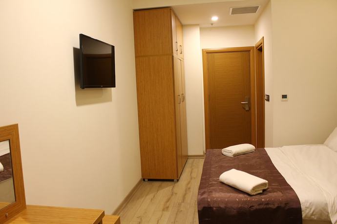 Imagen de la habitación del Hotel Melidium. Foto 7