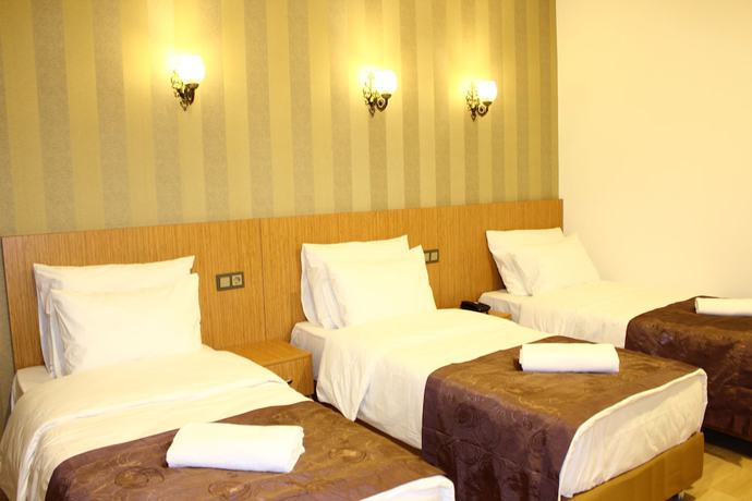 Imagen de la habitación del Hotel Melidium. Foto 8