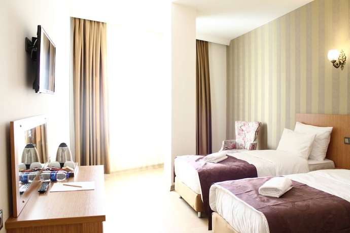 Imagen de la habitación del Hotel Melidium. Foto 14