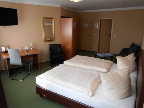 Imagen de la habitación del Hotel Merkur. Foto 4