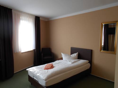 Imagen de la habitación del Hotel Merkur. Foto 6