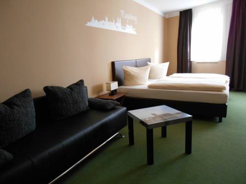 Imagen de la habitación del Hotel Merkur, Magdeburg. Foto 3