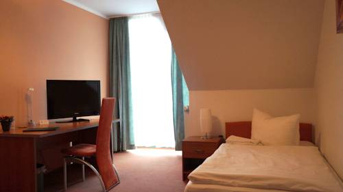 Imagen de la habitación del Hotel Merkur, Magdeburg. Foto 5