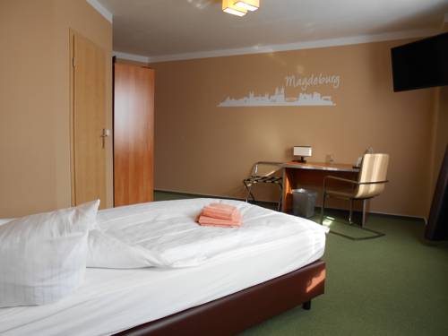 Imagen de la habitación del Hotel Merkur, Magdeburg. Foto 7