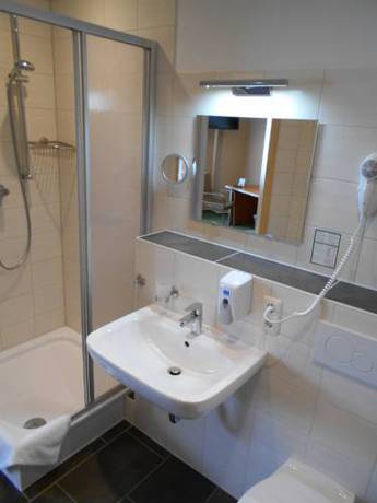 Imagen de la habitación del Hotel Merkur, Magdeburg. Foto 8