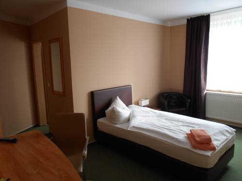Imagen de la habitación del Hotel Merkur, Magdeburg. Foto 9