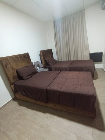 Imagen de la habitación del Hotel Meuble Parisien. Foto 12