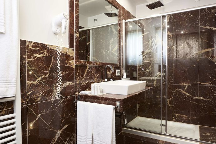 Imagen de la habitación del Hotel Michelangelo, Carrara. Foto 11