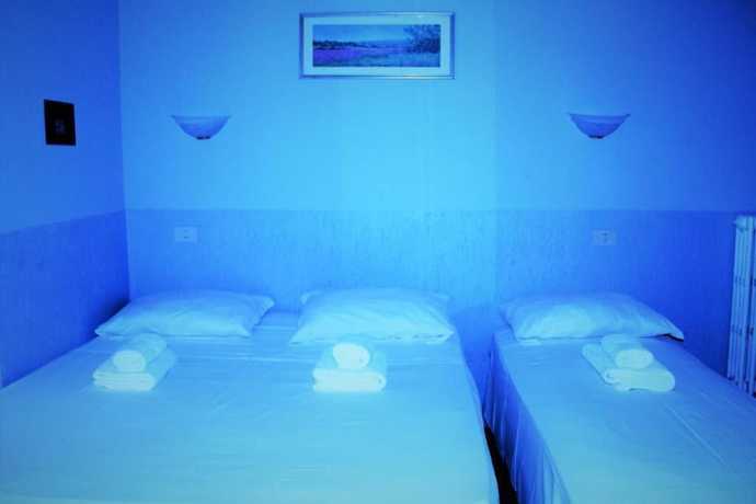 Imagen de la habitación del Hotel Moon Light. Foto 14