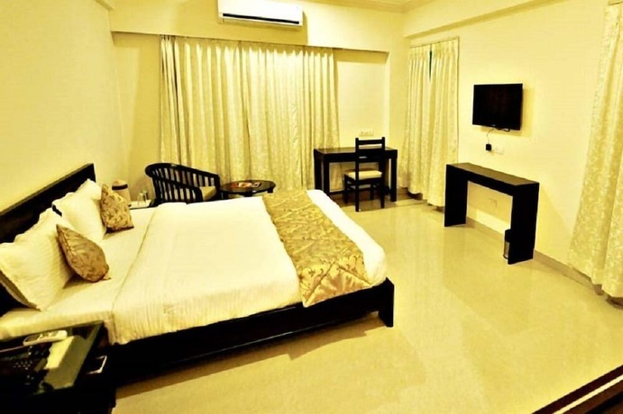 Imagen de la habitación del Hotel Mukund Villas. Foto 16