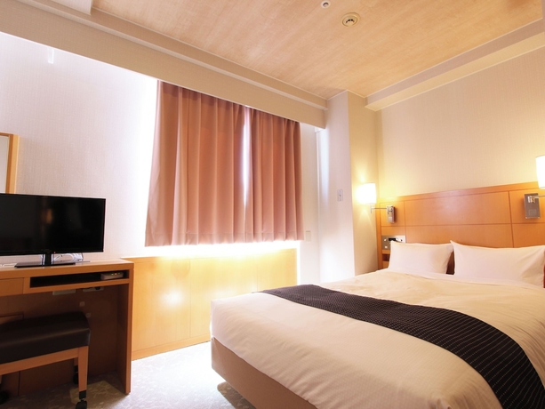 Imagen de la habitación del Hotel New Gaea Omuta Garden. Foto 7
