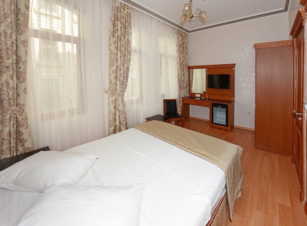 Imagen de la habitación del Hotel New House. Foto 3